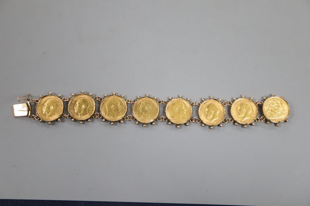 A 9ct mounted gold half sovereign bracelet, set with eight half sovereigns, gross weight 53.5 grams,